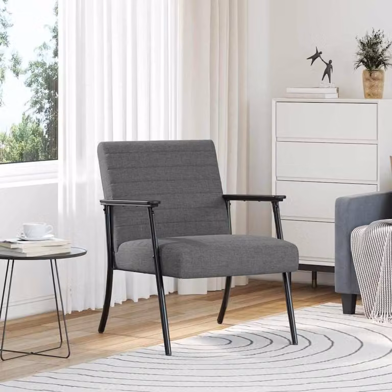 Poltrona di colore grigio scuro, in tessuto, dimensioni 59 x 75 x 78 cm, peso 10,25 kg