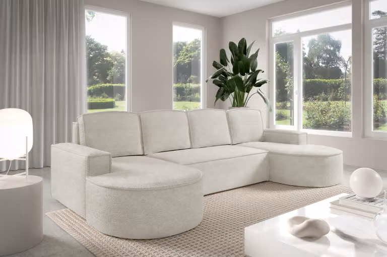 Divano angolare GUTTO Molly a forma di L, con linee arrotondate e in un elegante color verde crema: un design moderno e di tendenza! Novità 2025 (con funzione letto)