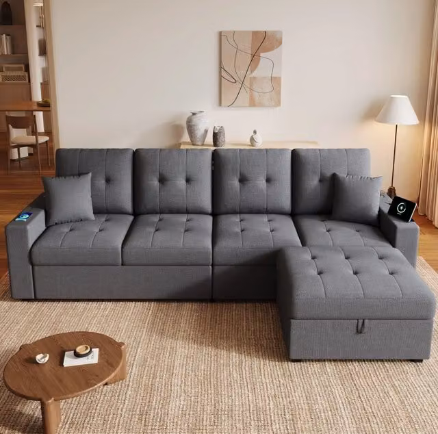 Divano angolare 4 posti 253 cm con pouf contenitore; LED e porte USB/Type-C grigio antico HOMVRA