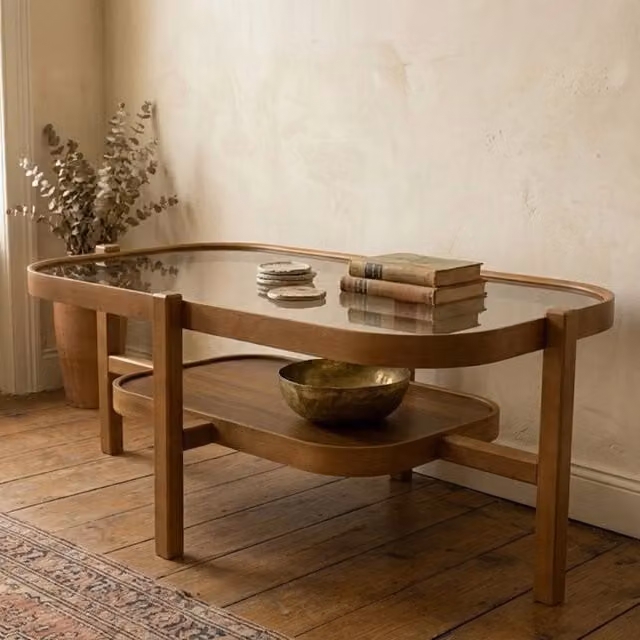 Tavolino da salotto moderno DMORA con piano in vetro trasparente e struttura marrone, L: 110 cm, P: 70 cm, H: 48 cm – 1