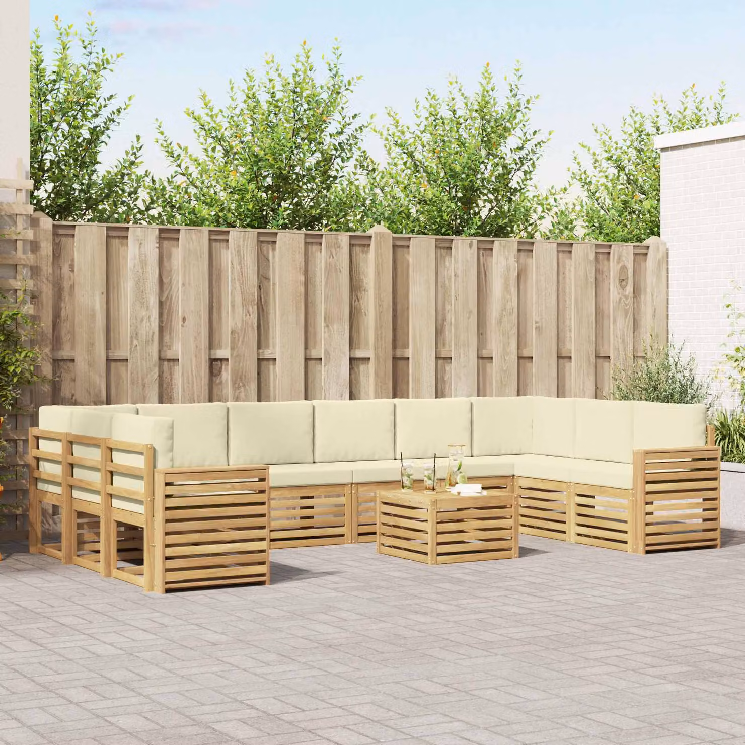 Set di divani da esterno vidaXL 11 pezzi a forma di L con tavolino da caffè, struttura in legno di acacia e cuscini in poliestere bianco e beige