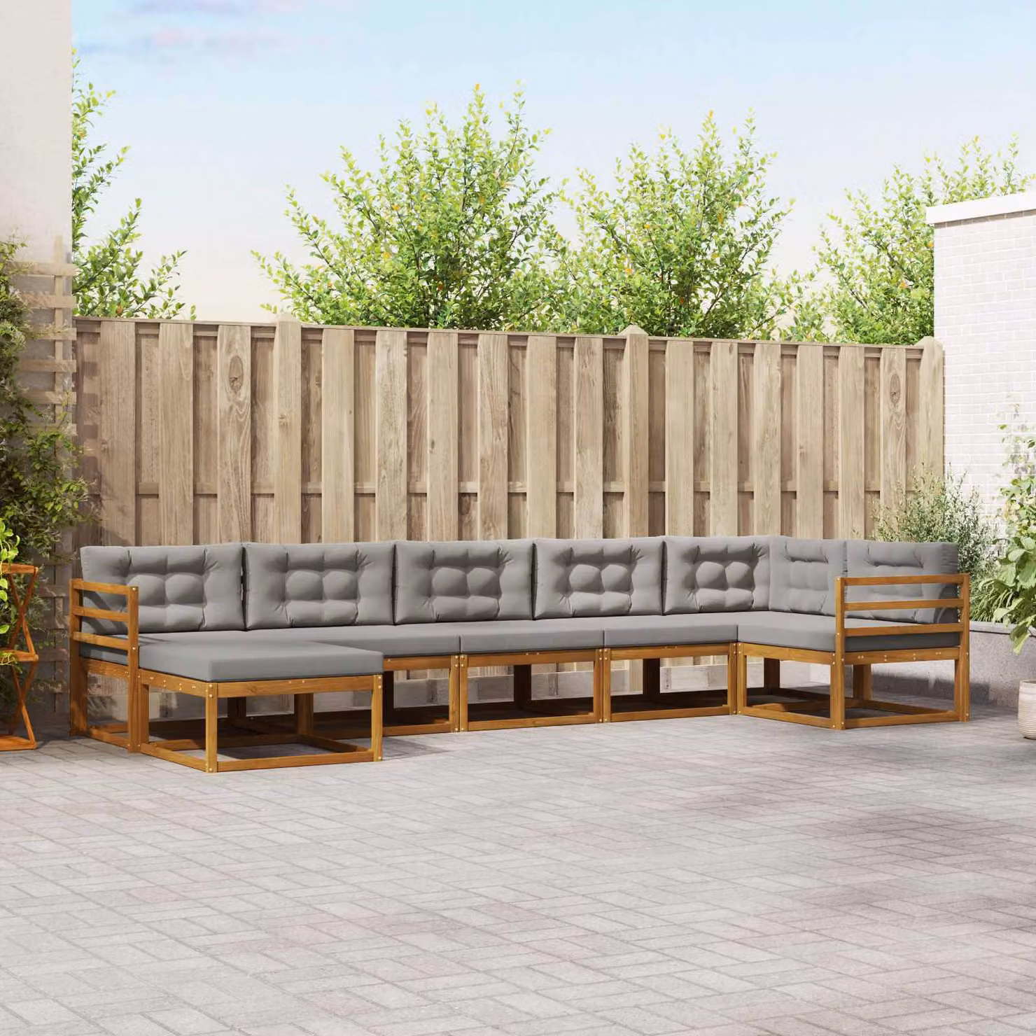 vidaXL Set di divani da esterno a L in legno di acacia con cuscini e pouf, Grigio