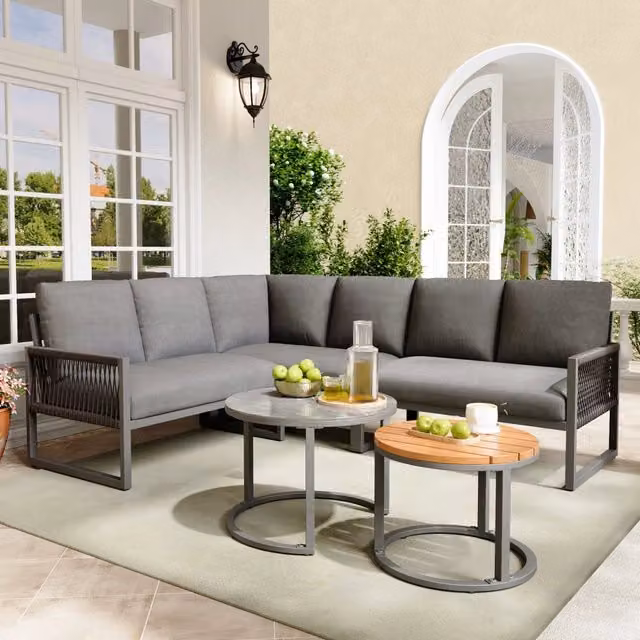 Set salotto da giardino angolare MODFU con cuscini, struttura in acciaio verniciato a polvere e tavolino da esterno, colore grigio