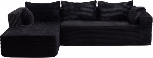 Divano modulare angolare a L in velluto a coste nero con chaise longue comoda, seduta profonda, design minimalista per soggiorno e camera