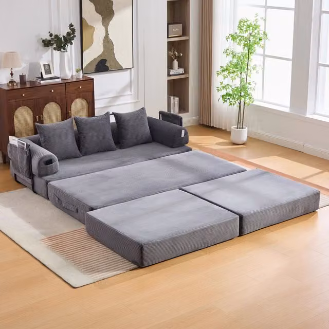 Divano modulare a L in velluto a coste grigio con pouf e 3 cuscini WISHDOR
