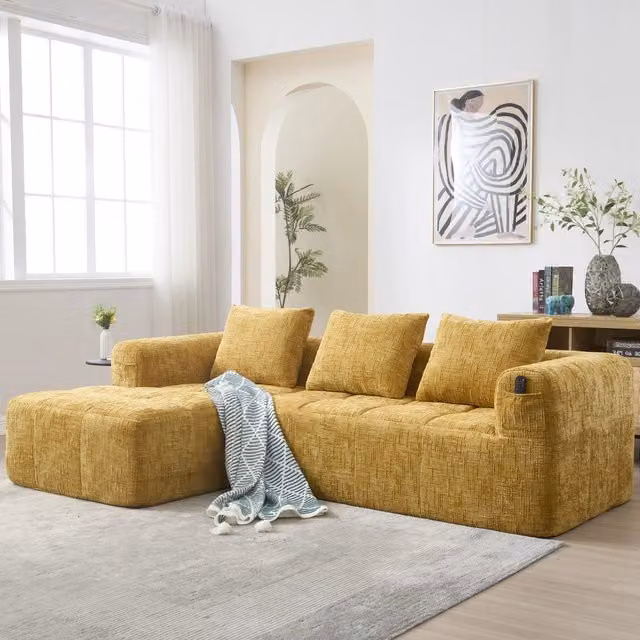 Divano angolare a L 3 posti senza montaggio con chaise longue; braccioli; 3 cuscini e tasca laterale; ciniglia; giallo
