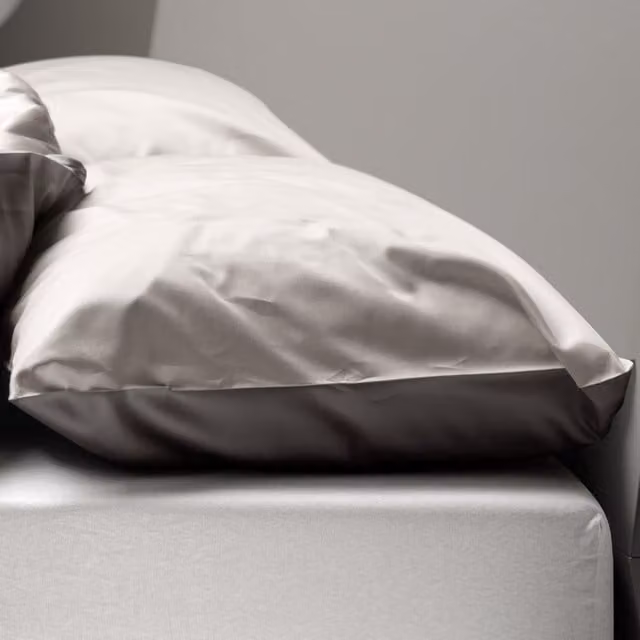 Federa copricuscino reversibile DaunenStep Oasi Kiss in cotone mako satin grigio con chiusura a zip