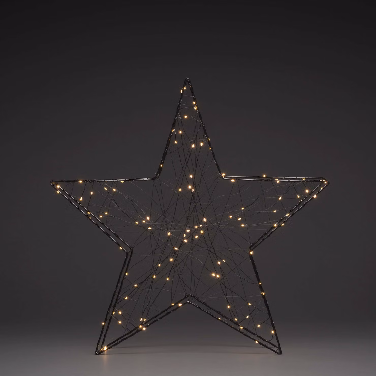 Stella di metallo Konstsmide LED, nera, 100 diodi bianco caldo