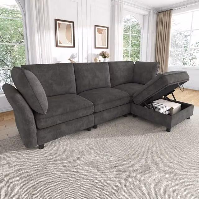 Divano angolare modulare Mivray a 4 posti in tessuto grigio con pouf contenitore e 2 cuscini L/P/H: 225 x 84 x 137 cm