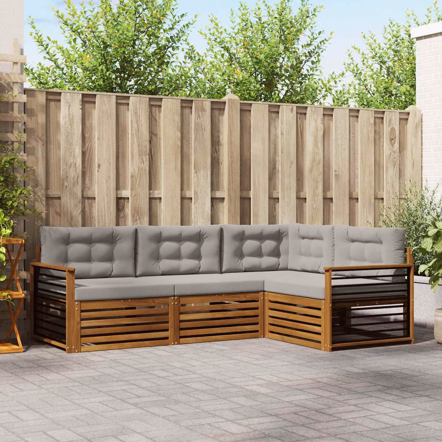 Set di divani da esterno vidaXL 4 pz a forma di L in legno di acacia con cuscini grigi e marroni