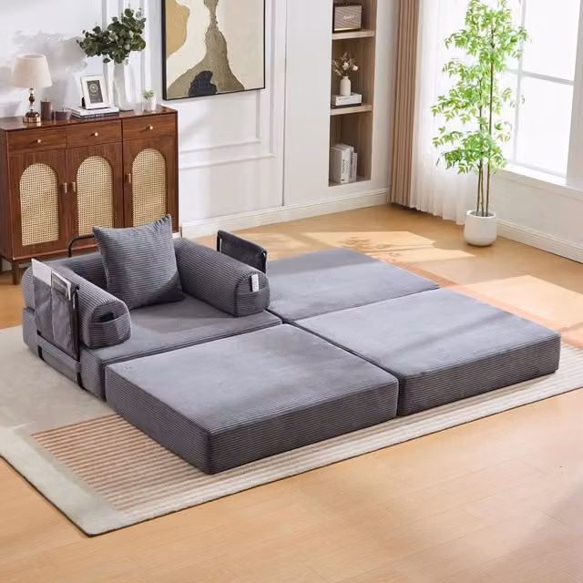 Divano modulare a L REDOM in velluto a coste grigio con pouf e cuscini, L/P/H: 190 x 112 x 67 cm