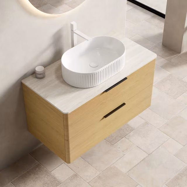 Mobile sottolavabo sospeso con lavabo ovale in ceramica e 2 cassetti chiusura ammortizzata piano in pietra sinterizzata