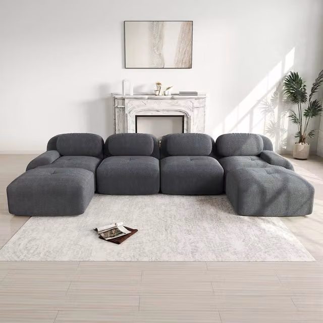 Divano 3 posti Minimal grigio in tessuto imbottito con braccioli larghi e design a L per il tuo soggiorno