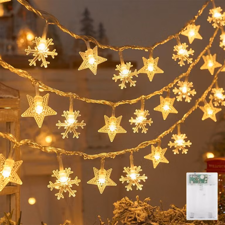 Catena luminosa da 3 metri, con 20 LED, decorata con stelle e fiocchi di neve, luce bianco caldo, alimentata a batteria