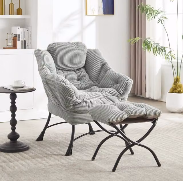 Poltrona relax con poggiapiedi, sedia lounge moderna con braccioli e tasca laterale, rivestimento in flanella verde chiaro