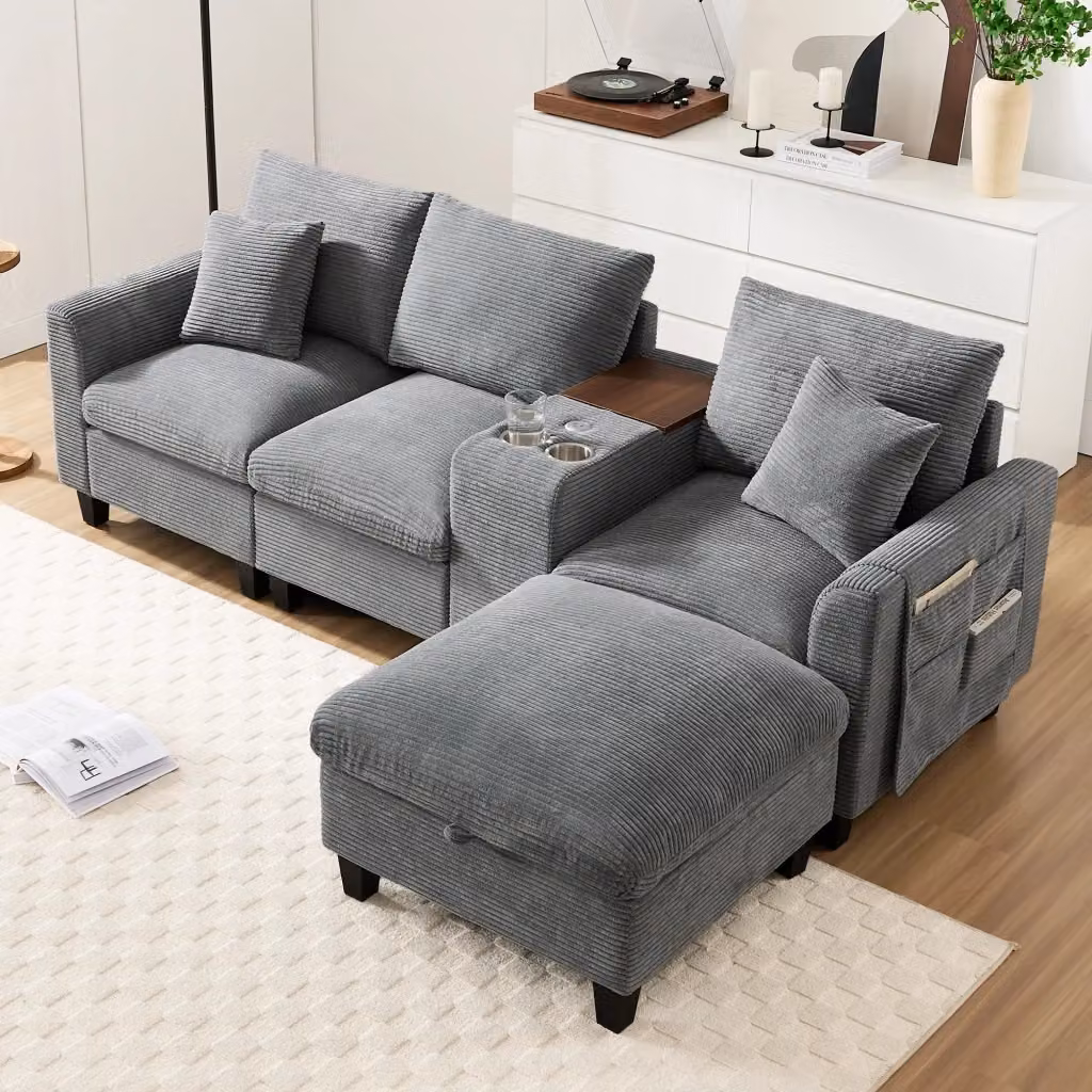 Divano angolare a L REDOM in velluto a coste grigio con pouf, 2 cuscini, porta bicchieri e ricarica USB, L/P/H: 229 x 149,5 x 83 cm – 2