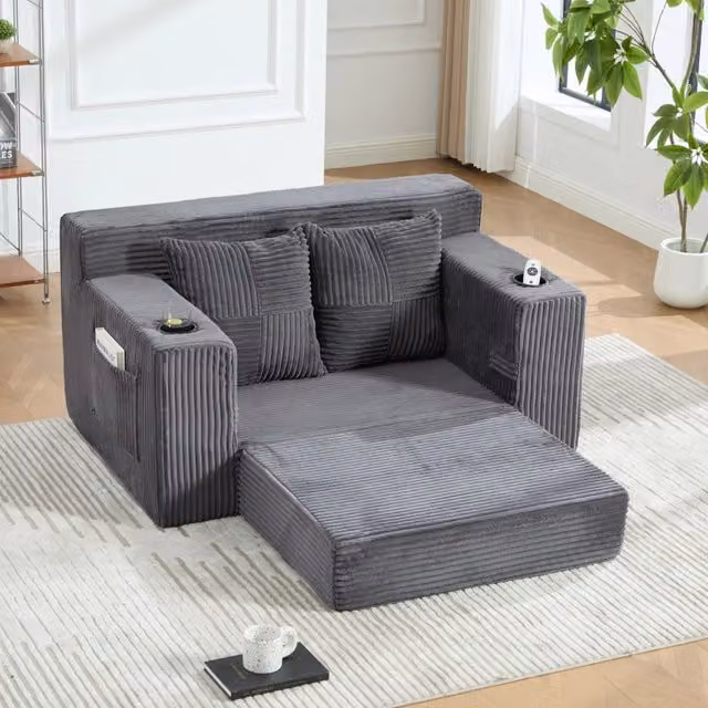 Divano pouf in velluto a coste grigio con tasche laterali 151x133 cm HOMVRA