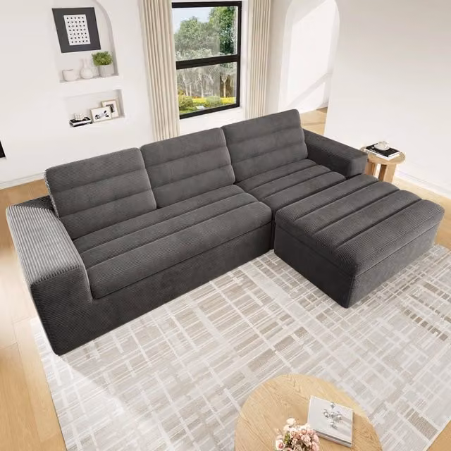 Divano angolare modulare a L Vovees Living da 4 posti con pouf in velluto a coste grigio, L/P/H: 253 x 161 cm