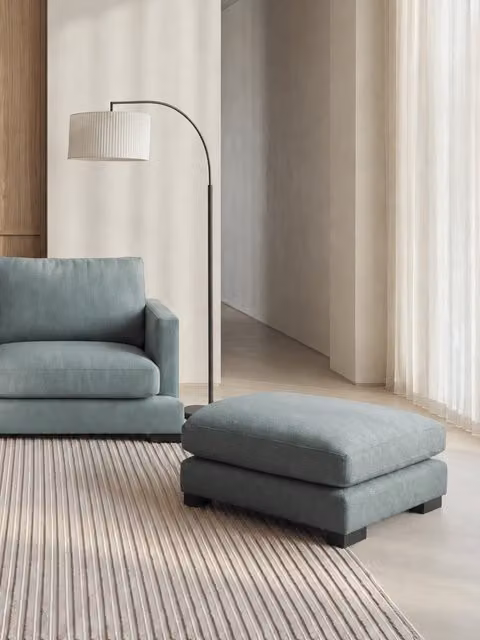 Pouf Crate Kenay Home rivestito in tessuto color acquamarina, diametro 90 cm