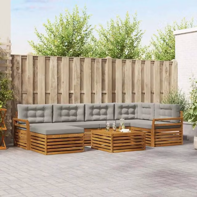 Set di divani da esterno a L vidaXL in legno di acacia con cuscini grigi, composto da 7 pezzi con tavolino, elemento angolare, pouf e divano a 3 posti – 1