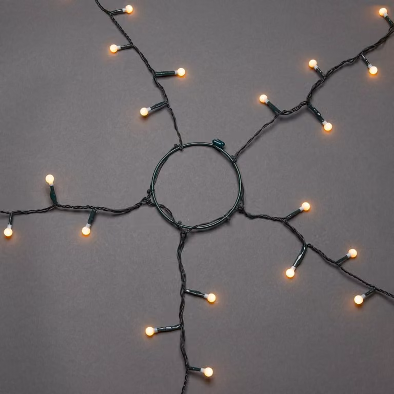 Konstsmide LED albero mantello con anello Ø 11, con globi, 5 fili di 30 diodi ciascuno, preassemblati, 150 diodi color ambra, trasformatore 30V_interno, cavo verde - 6367-820