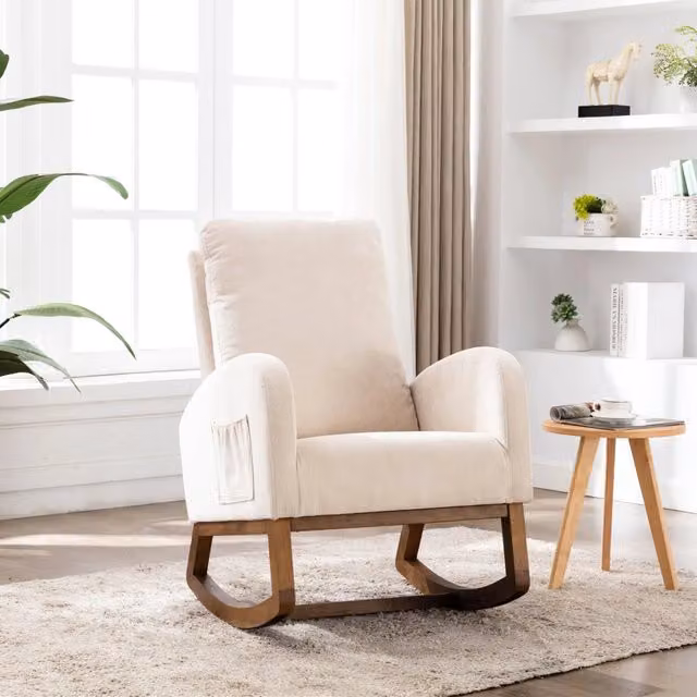 Poltrona a dondolo imbottita in lino beige con schienale alto