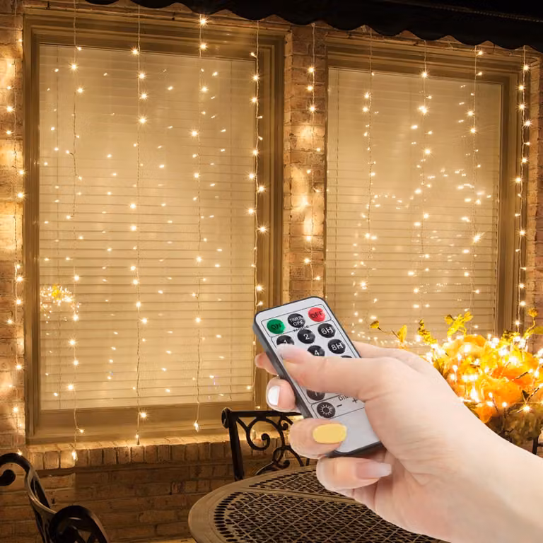 Catena luminosa - 100 LED bianche calde - 3 x 1 metro - 230V - con telecomando