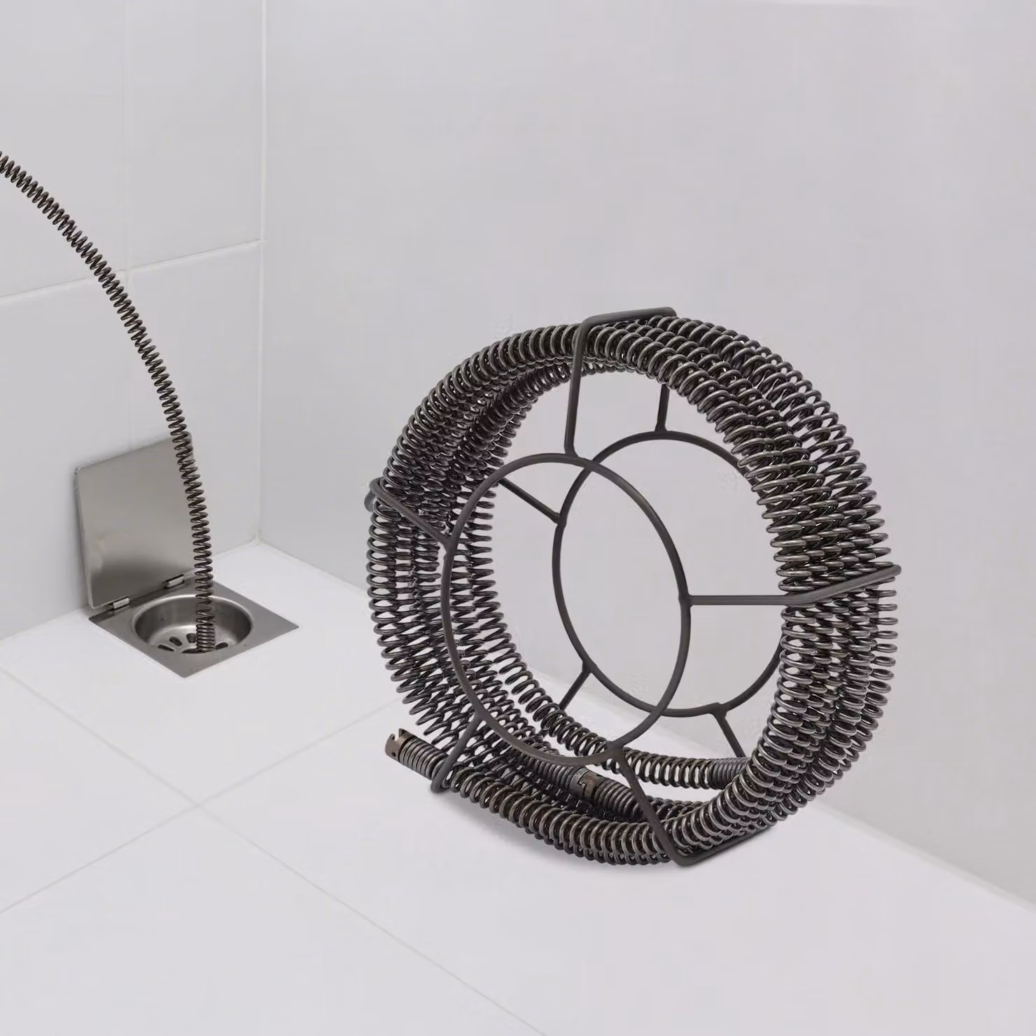 Detergente per scarichi - Spirale per la pulizia dei tubi - Diametro 22 mm - Lunghezza 7 metri - Realizzata in filo di acciaio - Adatta per scarichi e WC - Contro le ostruzioni più ostinate