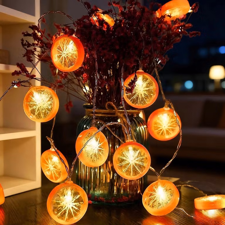 Catena luminosa con decorazioni a forma di fetta d'arancia, lunghezza 150 cm, 10 LED, alimentata a batteria