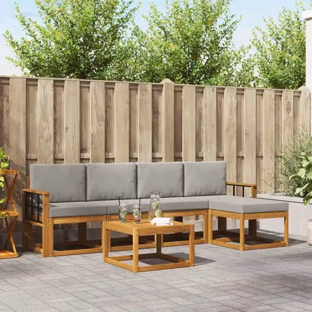 Set da giardino moderno vidaXL composto da divano a L da 3 posti, pouf e tavolino da esterno in legno di acacia trattato, colore grigio