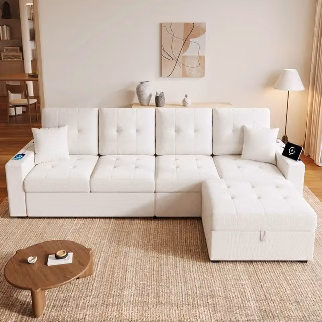 Divano angolare MIVRAY a 4 posti con pouf contenitore reversibile in tessuto beige, dotato di illuminazione LED, ricarica USB e cuscini decorativi, H 80,7 x L 253 x P 144,5 cm