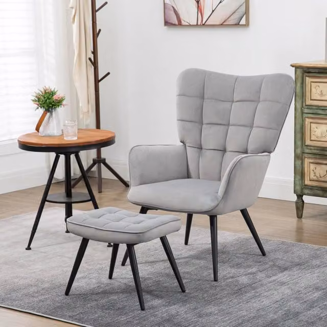 Poltrona con orecchie e poggiapiedi in velluto grigio chiaro, set relax fino a 120 kg
