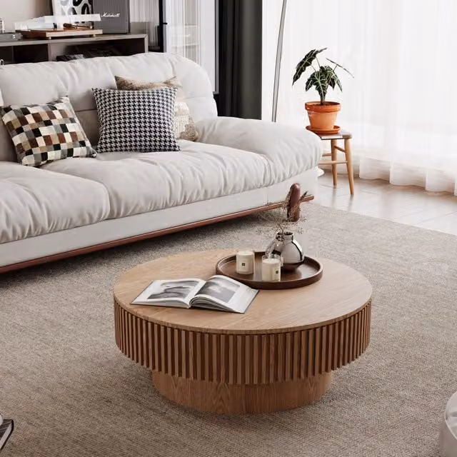 Tavolino basso fisso con contenitore nascosto in legno e MDF naturale; piano rotondo con motivo scanalato