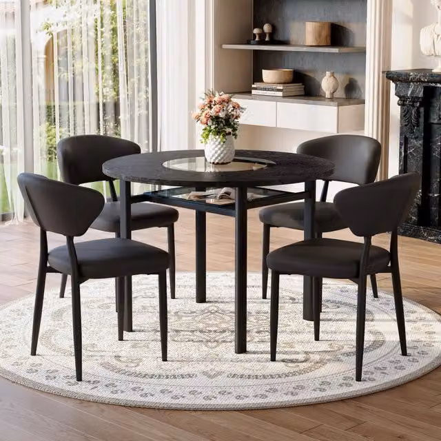 Set tavolo e sedie rotondo con piano in MDF e inserto in vetro; sedie in PU e metallo nero