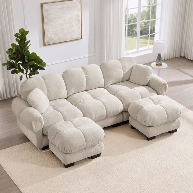 Divano modulare a U OKWISH in chenille beige con pouf e cuscini, seduta trapuntata morbida e stabile, L: 260 cm, P: 149 cm, H: 90 cm