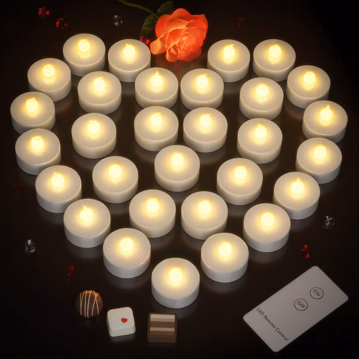 Set di 30 candele tealight a LED Monzana con telecomando, effetto flickering e luce bianco caldo, colore argento – 2