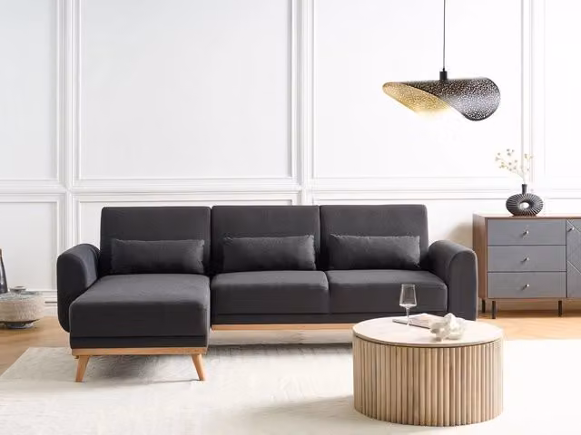 Divano letto ad angolo BELIANI nero con rivestimento in tessuto e gambe in legno di faggio, design moderno con cuscini inclusi e coperture rimovibili, L 258 x P 147 x H 88 cm
