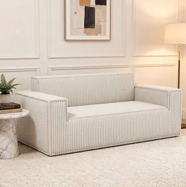 Divano con seduta profonda in corduroy bianco sporco