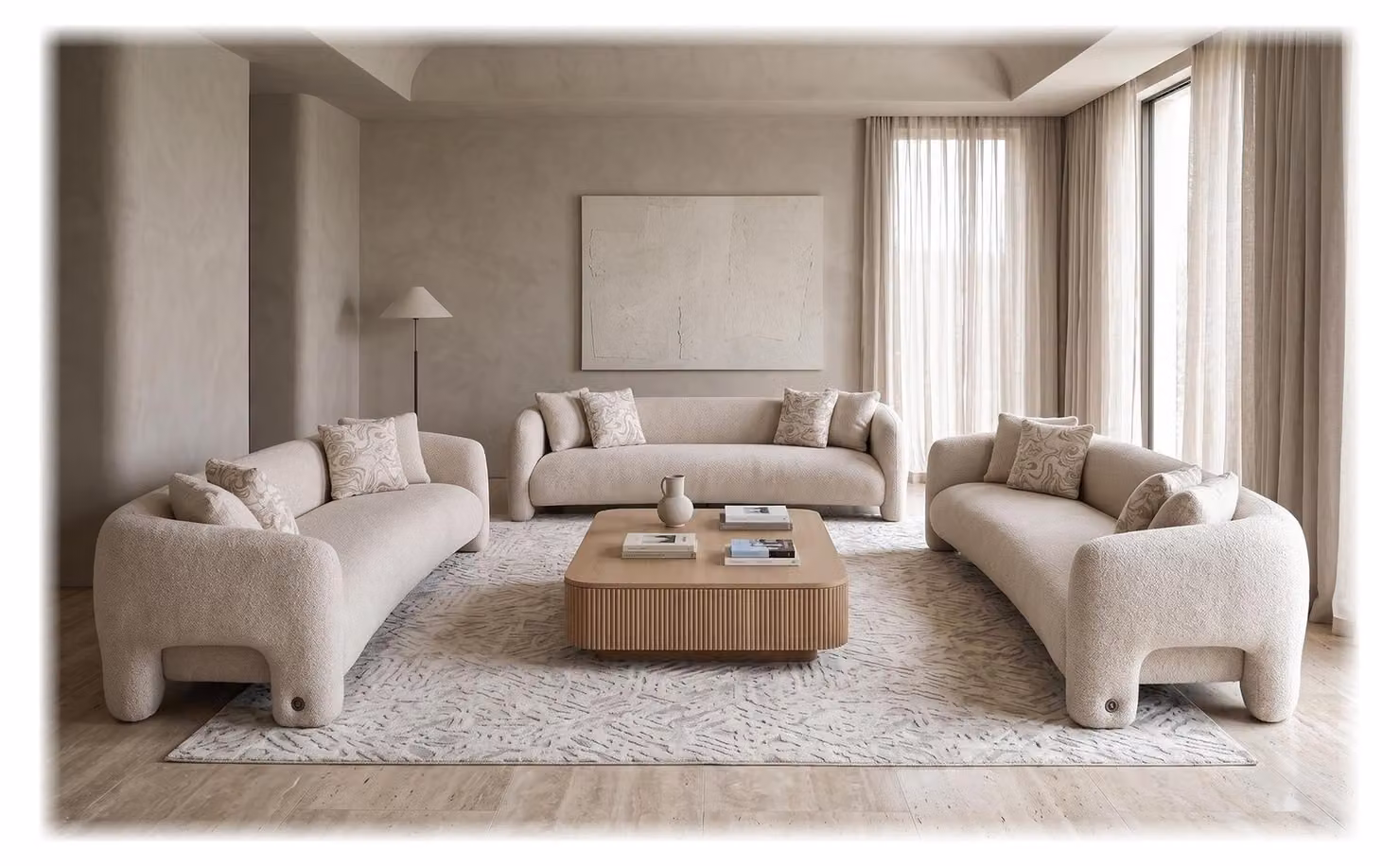 Set di divani per soggiorno, composto da tre divani beige, dal design moderno e dalle linee curve