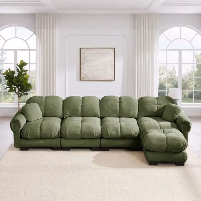 Divano angolare a 4 posti Mivray in velluto verde con ottomana coordinata e cuscini, design moderno a L con orientamento destro, L/P/H: 330 x 149 x 97 cm