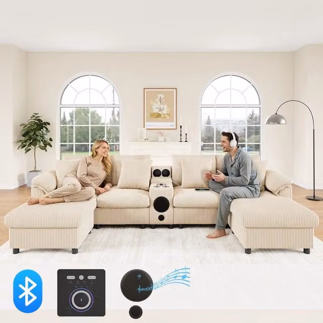 Divano angolare Minimal beige in tessuto con contenitore e cuscini, modello a 4 posti con porta bicchieri e ricarica USB