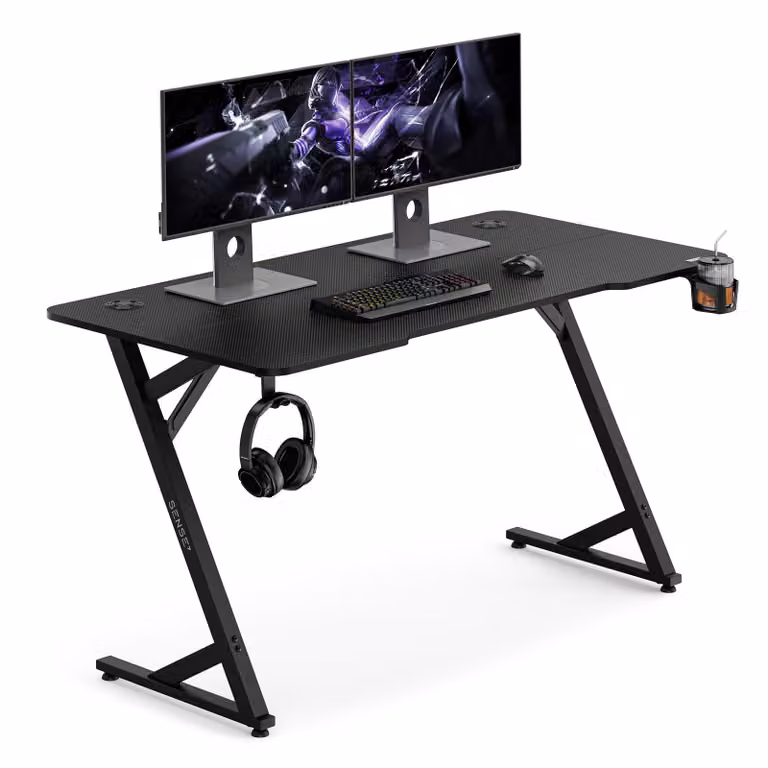 Sense7 VAMO, scrivania da gaming, 140x70 cm, nera, per computer, PC, design a forma di Z, con portabicchieri, ideale per l'ufficio domestico e l'ambiente lavorativo