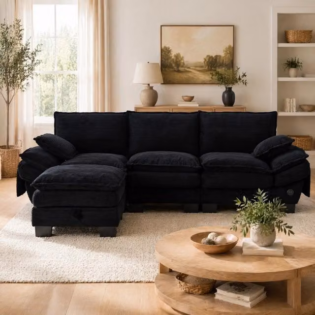 Divano modulare REDOM a 3 posti con pouf, modello L-shape in velluto a coste nero, L/P/H: 260 x 132 x 84 cm