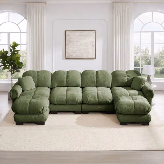 Divano angolare 4 posti Minimal verde in tessuto trapuntato con poggiapiedi coordinato e struttura reversibile – 1