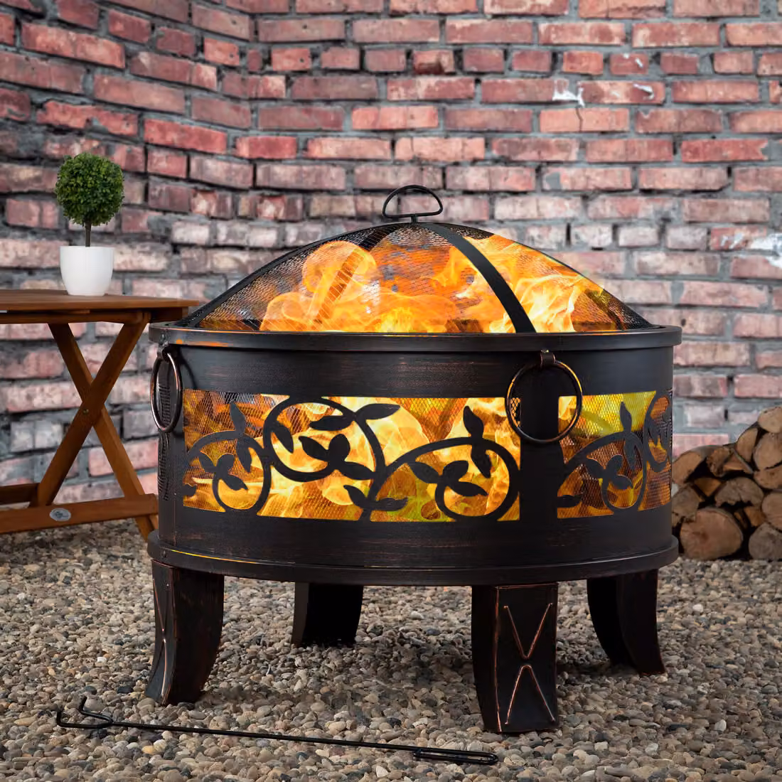 Braciere da esterno Gardebruk con cestello per legna in acciaio, disponibile in nero o bronzo, Ø 66 cm – 2