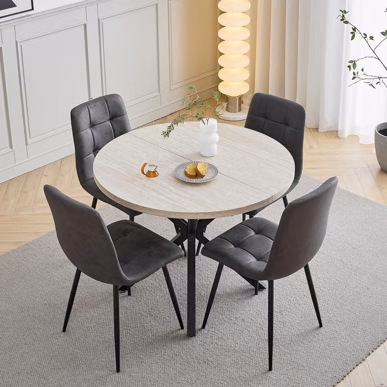 Set da pranzo composto da: 4 sedie, 1 tavolo rotondo di 100 cm di diametro, rivestito in ecopelle, colore giallo/grigio scuro