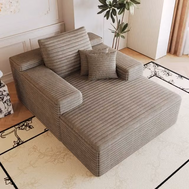 Divano con chaise longue in velluto a coste color cammello; senza montaggio