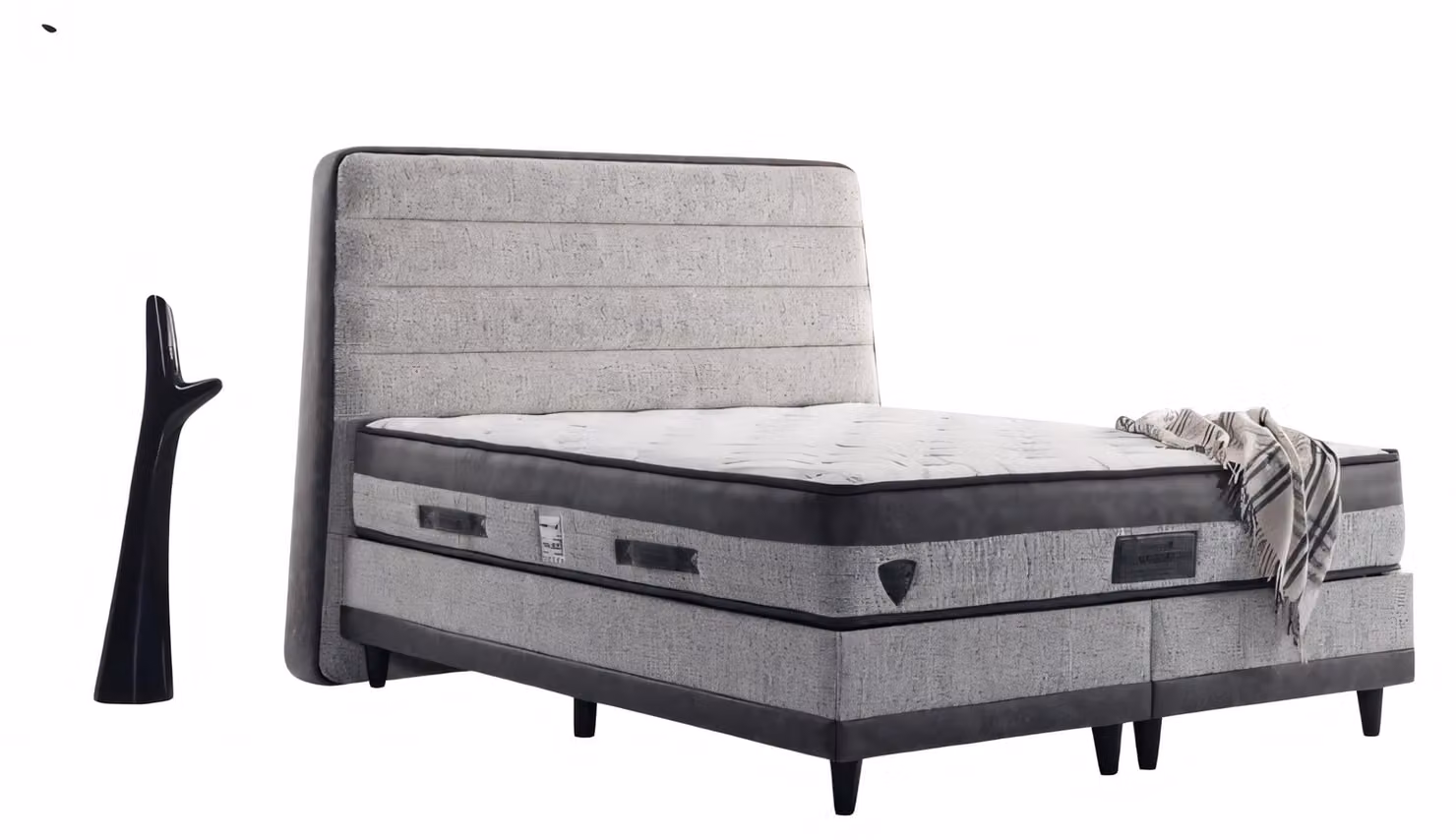Elegantes Bett in Grau mit schwarzen Beinen und hohem weichen Kopfteil