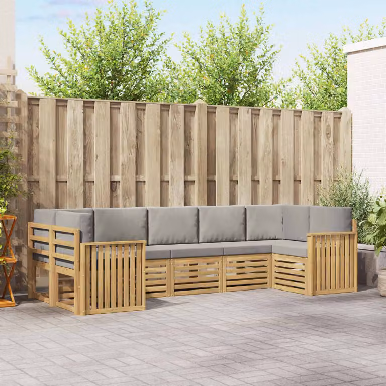 Set di divani da esterno vidaXL 7 pz a forma di L in legno di acacia con cuscini bianchi e grigi