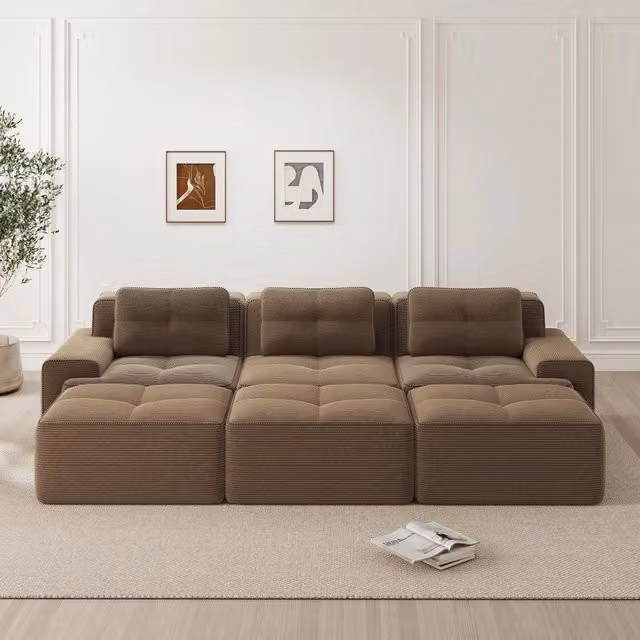 Divano angolare modulare OKWISH con funzione letto, seduta profonda e braccioli larghi in velluto a coste marrone